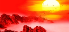 红色背景/太阳与高山图片